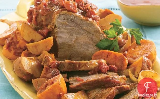 슬로우 쿠커 치포 틀레 돼지 고기 로스트