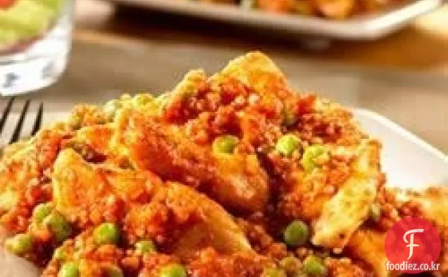 완두콩과 키노아를 곁들인 닭고기