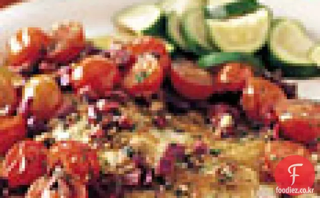 올리브와 체리 토마토를 곁들인 매운 생선 볶음