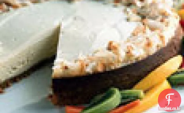 코코넛 쇼트 브레드 크러스트를 곁들인 열대 치즈 케이크