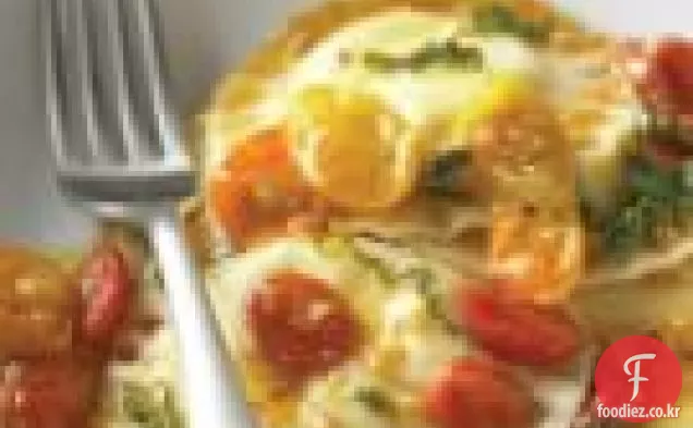 체리 토마토 소스를 곁들인 치즈 라비올리